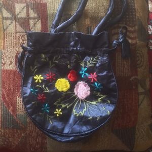 Dark blue embroidered silk pouch
